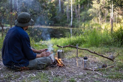 cooking over campfire with crane