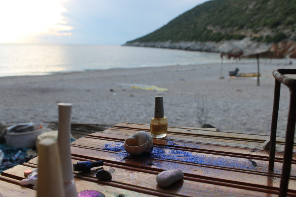 We found an abandoned bag on the beach filled with nail polish and glitter!!! We used it to decorate rocks and shells. :)