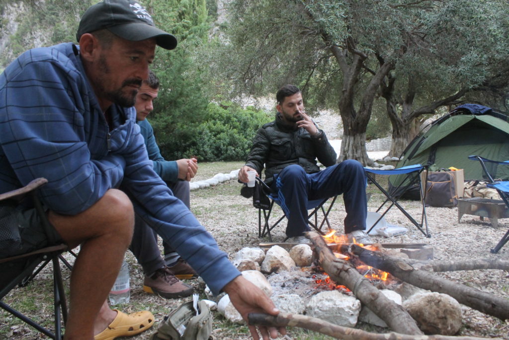 Hanging out around the fire with camping neighbors