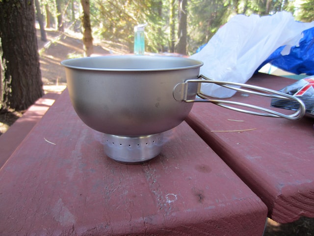 Cooking on a DIY alcohol stove made from soda cans