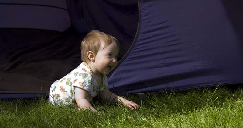 baby camping in tent